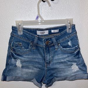 Mid Rise Distressed Jean Shorts